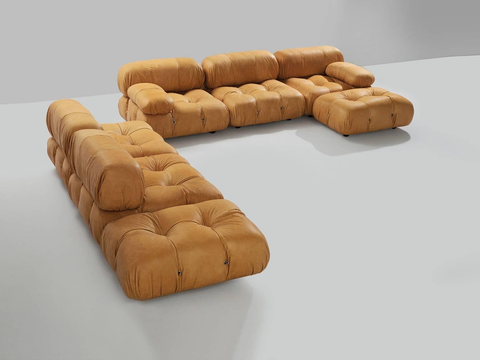 Large modular 'Cameleonda' sofa, in cognac leather upholstery by Mario Bellini for B&B Italia, Italy, 1972.

The sectional elements this sofa was made with can be used freely and apart from one another. The backs and armrests are provided with