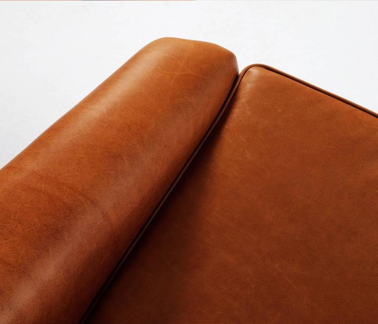 Set of Two Danish Reupholstered Lounge Chairs in Cognac Leather at 1stDibs