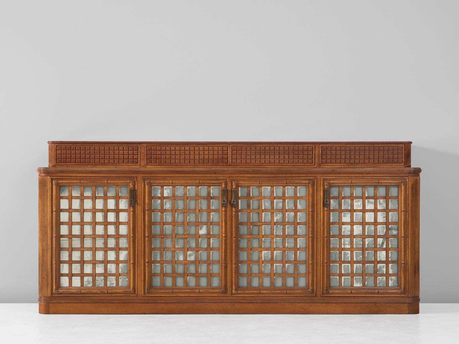 Sideboard, in walnut, bamboo and glass, for Giorgetti, Italy, 1970s.

Beautiful detailed Italian credenza. This cabinet consist of two levels. The large storage compartment, with four doors and a top level with four drawers. All elements on this