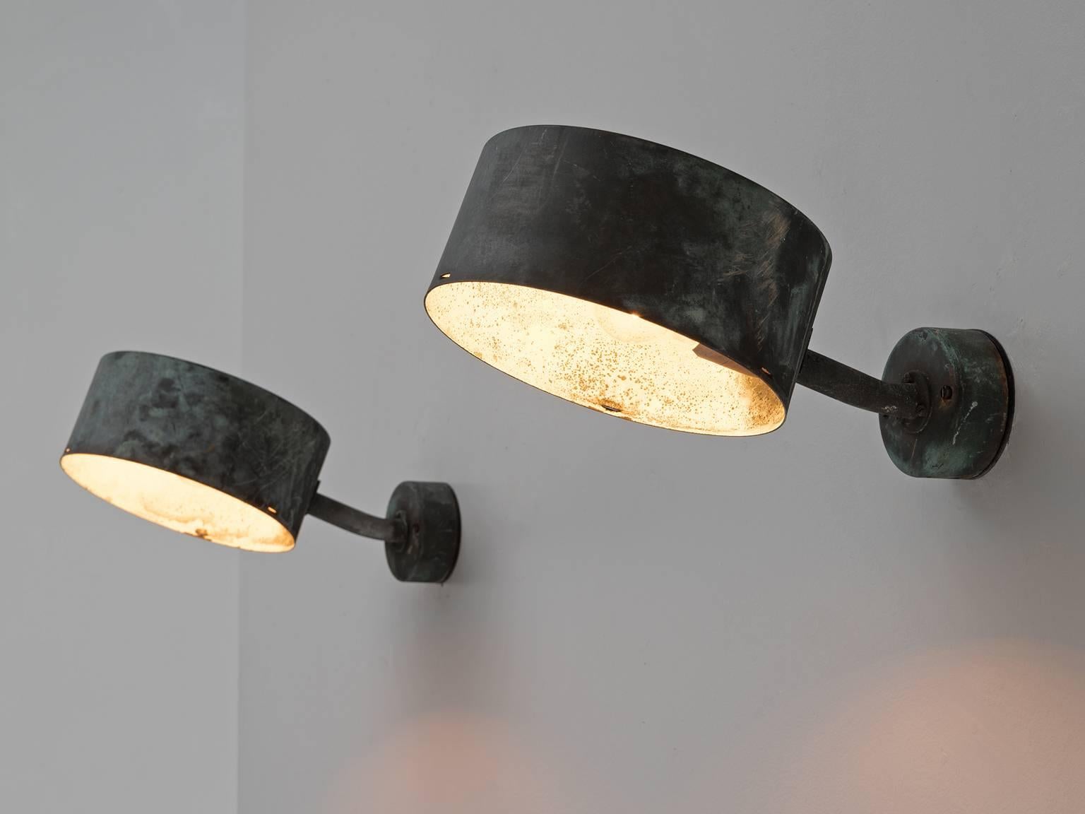 Set of two wall lights, in copper and metal, by Hans-Agne Jakobsson for AB Markaryd, Sweden, 1950s. 

Set of two wall lights designed by Hans-Agne Jakobsson for AB Markaryd in beautifully patinated copper. Well known are the cone shaped wall lights,
