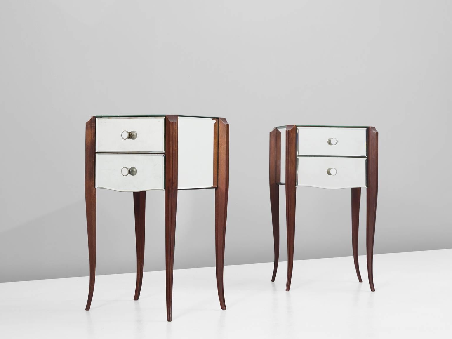 Set of two nightstands, in beech and glass, France, 1940s. 
 
Wonderful pair of shimmering nightstands in wood and mirrored glass. These Art-Deco style side tables have a nice open character due their high wooden legs. A fragile appearance is