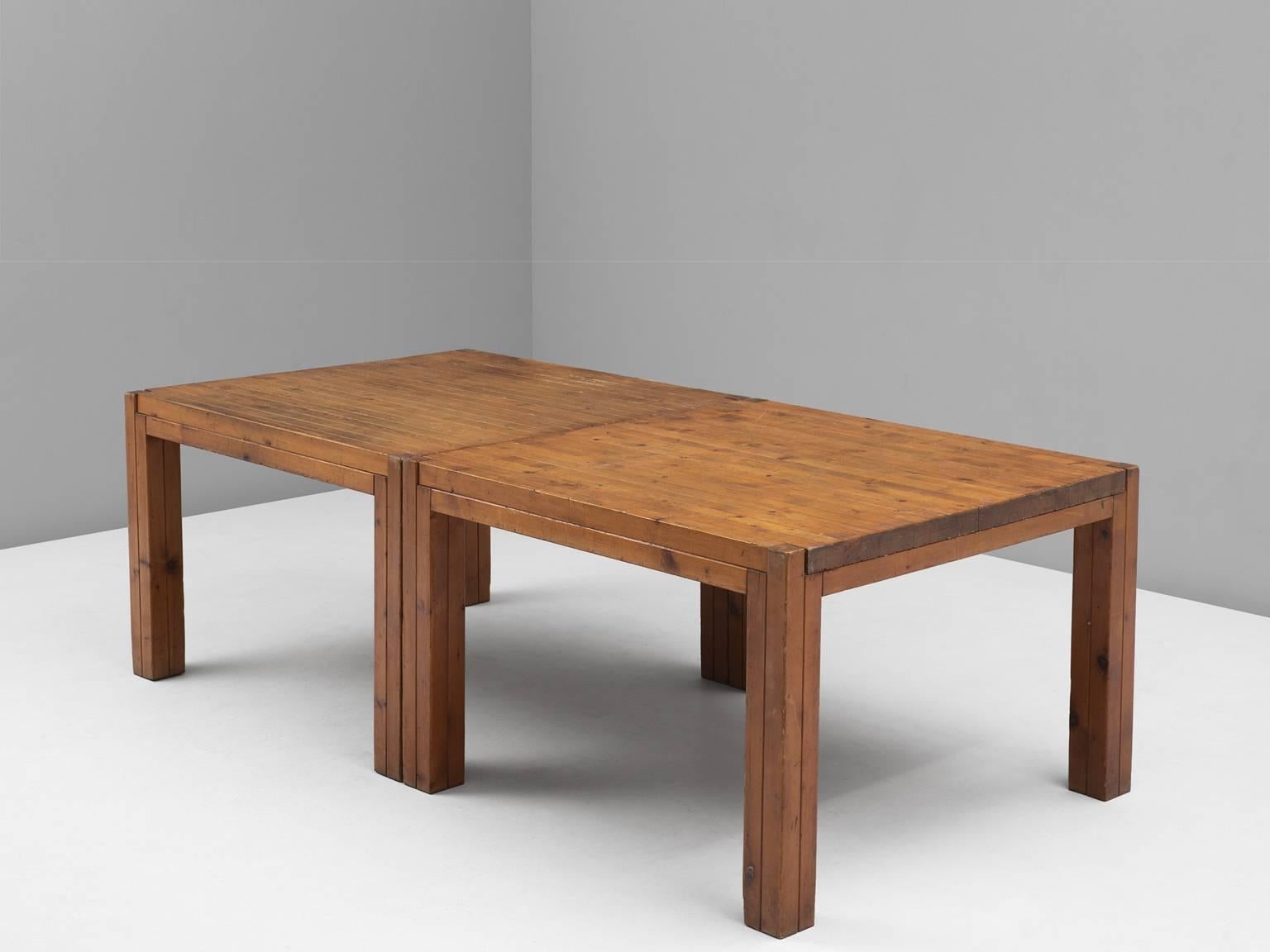Set of two dining tables, in pine, Italy, 1960s. 

Large dining table in pine. This table consists of two square tables, combined to one large table. The pinewood shows an admirable patina, especially visible on the table's top. A nice graphical