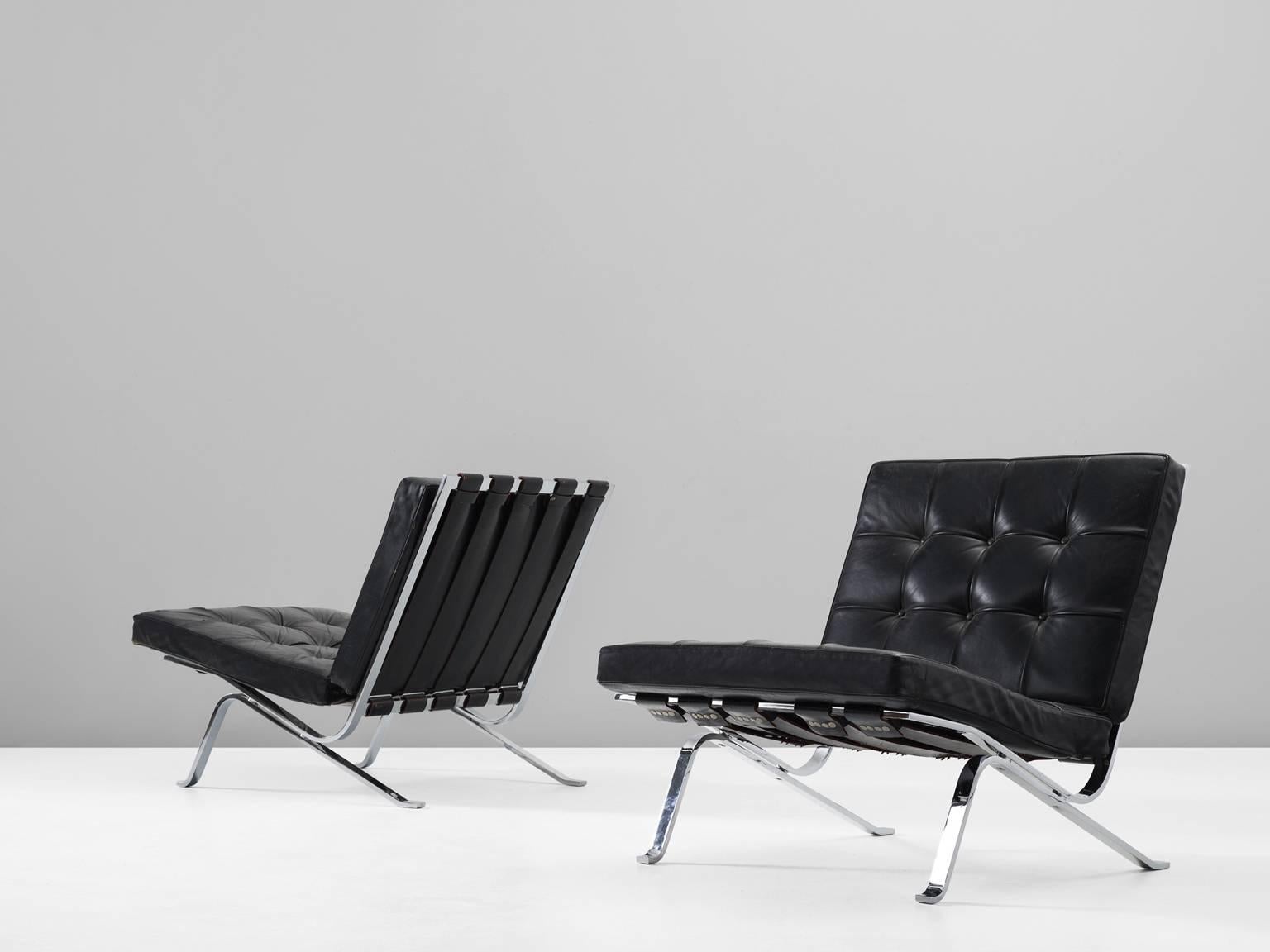 Set of two easy chairs model RH301, in chromed metal and black leather, by Robert Haussmann, Switzerland 1950s. 

A pair of 2 rare and early chairs by Swiss born architect Robert Haussmann. This chair was an homage by Haussmann to his idol and