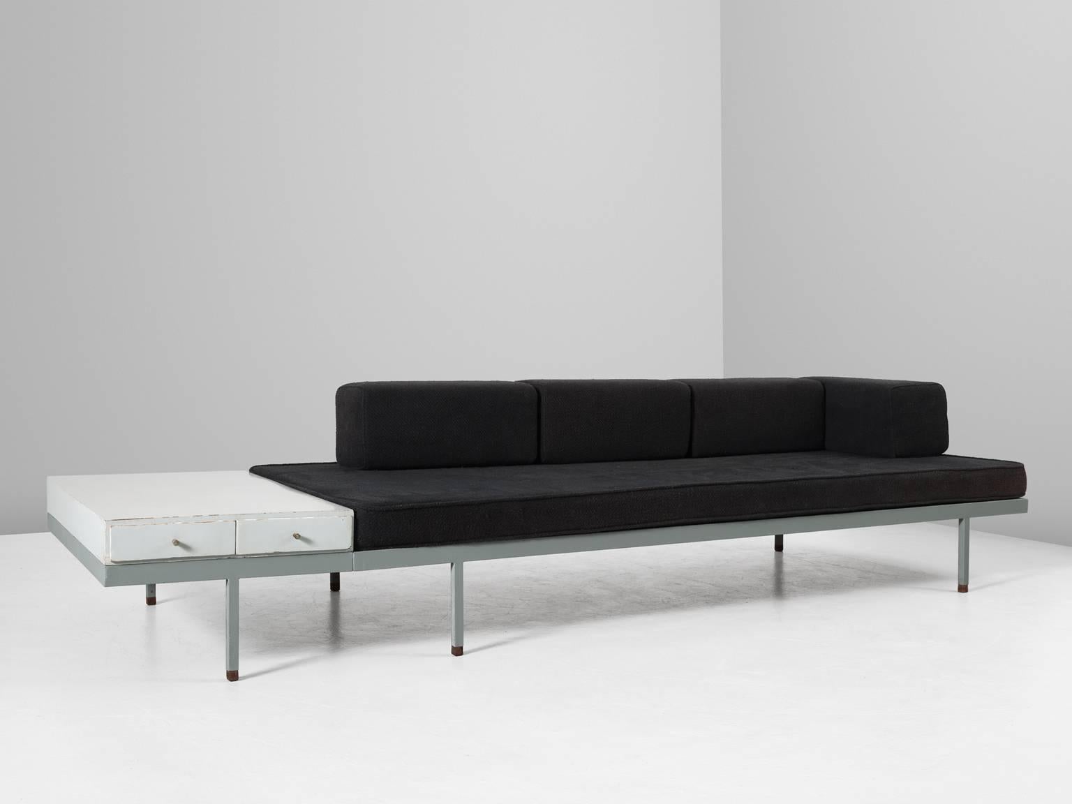Bench, in metal, wood and fabric, Europe 1960s. 

Modern sofa with black fabric upholstery and metal frame. With side table and integrated drawers.Sleek and modern design due the straight lines and metal frame. The integrated side table is a nice