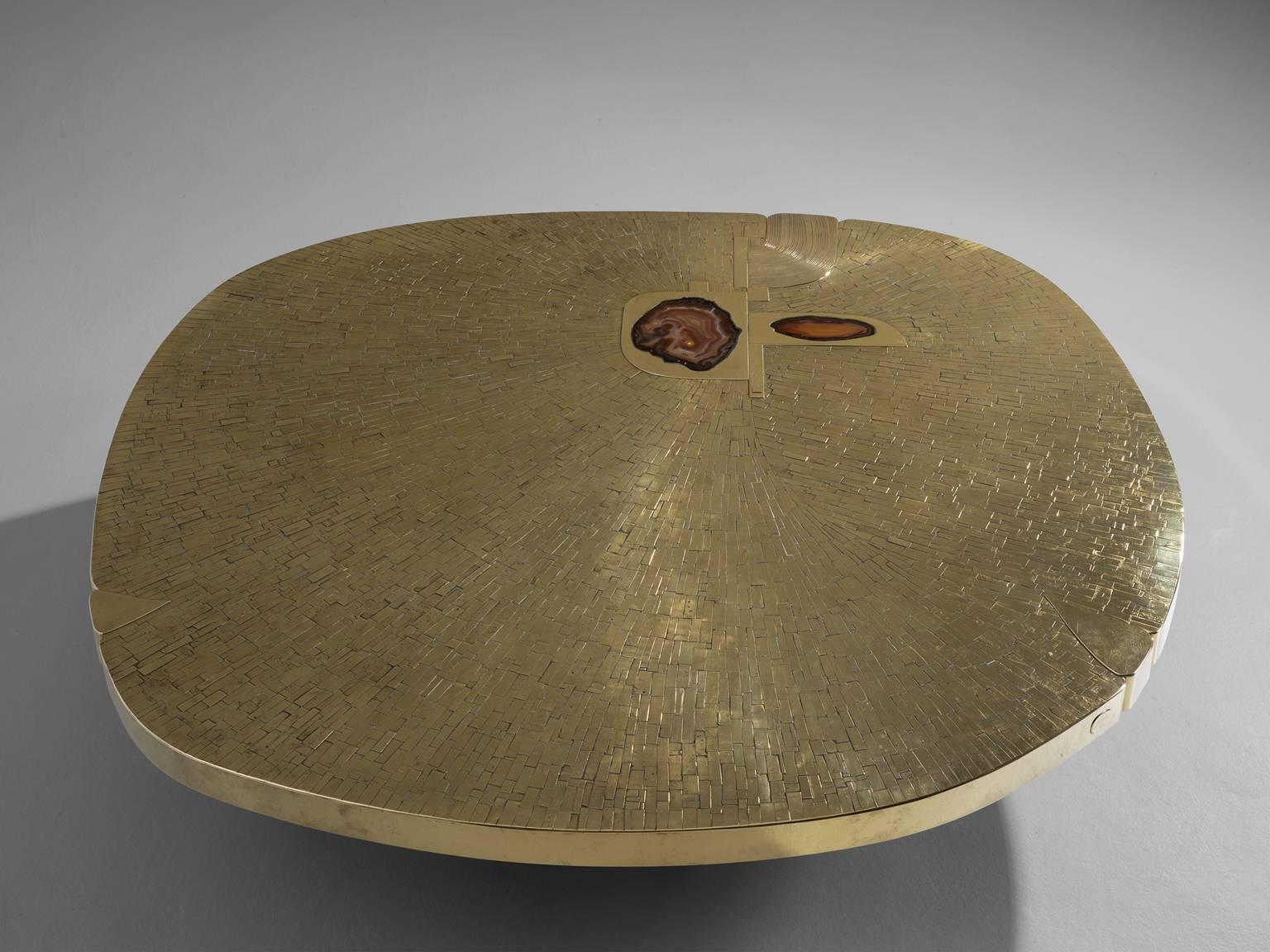 Coffee table, in brass and agate, by Jean Claude Dresse, Belgium, circa 1970.

Sculptural coffee table for a private commission for an important Parisian interior. Applied brass tiles with agate and etched details. Signed on the side of the