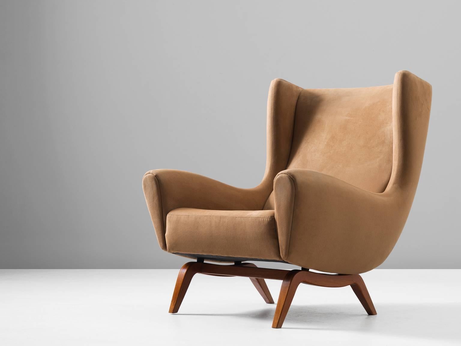 Lounge chair model 110 in teak and fabric, by Illum Wikkelsø for Søren Willadsen, Denmark, 1950s. 

This well-designed armchair shows an unusual elegance and great eye for detail, combined with outstanding craftsmanship, which is characteristic