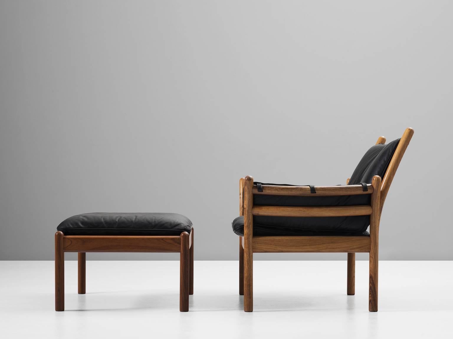 Danish Illum Wikkelsø Solid Rosewood Lounge Chair and Ottoman