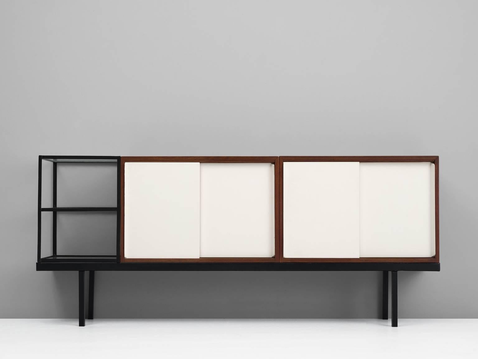Credenza model KW63/Bornholm, in teakwood, metal and glass, by Martin Visser for 't Spectrum, circa 1956. 

Modern sideboard in mixed materials. This sofa has a metal base and three storage parts. These parts are modular and can be placed freely