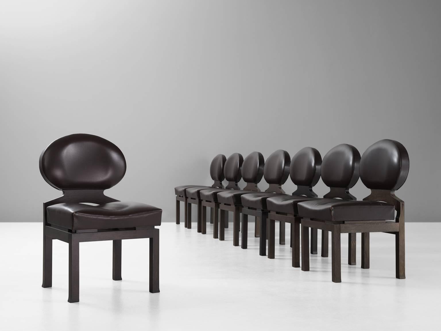 Set of eight 'Osaka' chairs, in oak and leather, by Emiel Veranneman, Belgium, 1970. 

The Osaka dining chair was designed by Emiel Veranneman for the Belgian pavilion at the 1970 Wold Exhibition in Osaka, Japan. These chairs are a combination of