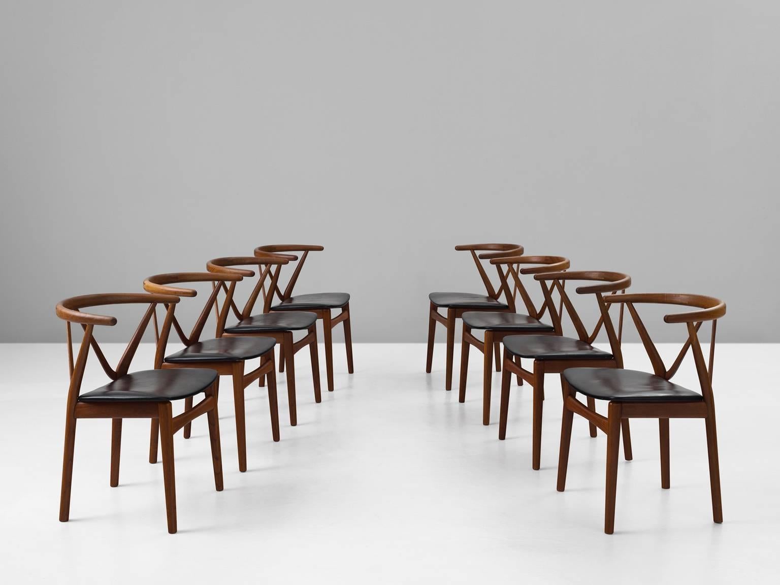 Mid-Century Modern Henning Kjaernulf Set of Eight Dining Chairs in Teak and Black Upholstery
