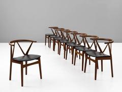 Henning Kjaernulf Set of Eight Dining Chairs in Teak and Black Upholstery