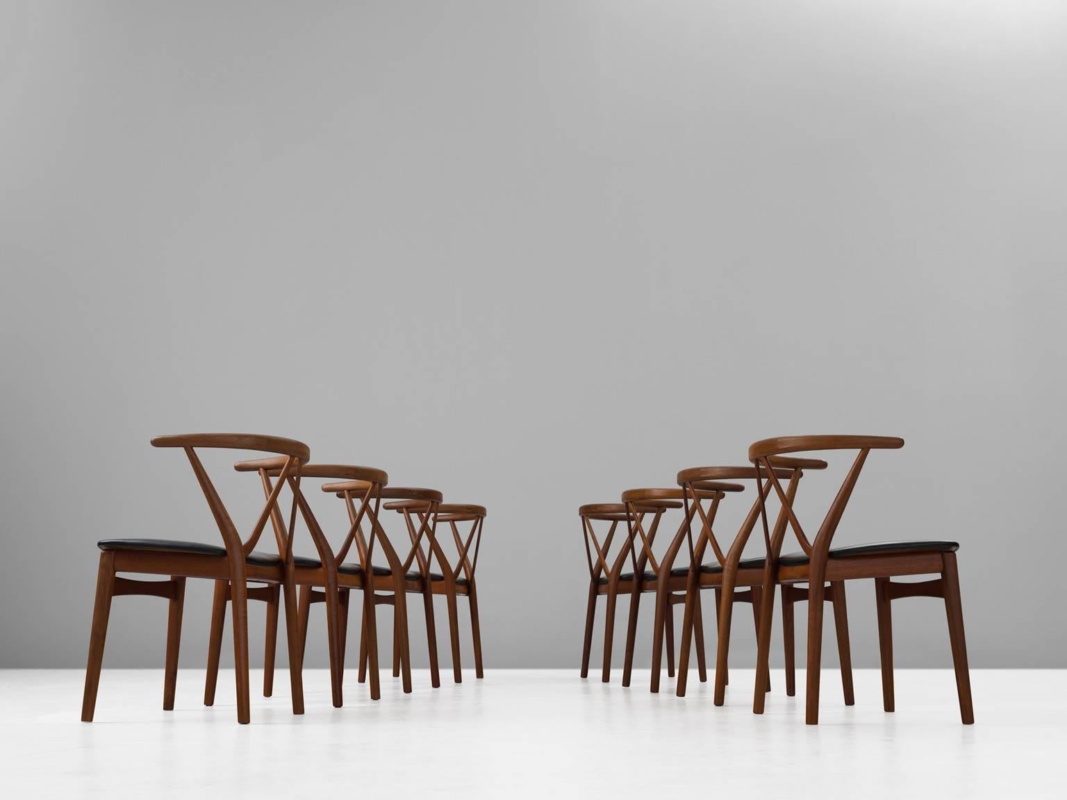 Danish Henning Kjaernulf Set of Eight Dining Chairs in Teak and Black Upholstery