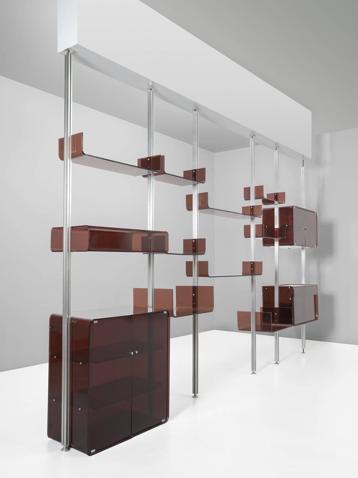 Modular wall system, in acrylic and aluminum by Michel Ducaroy for Roche Bobois, France, 1970s.

Free standing shelves by French manufacturer Roche Bobois. This bookcase consists of five vertical compartments, which can be arranged to your own
