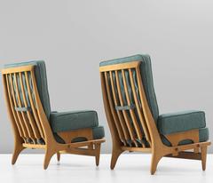 Guillerme & Chambron Set of Two High Back Lounge Chairs in Oak