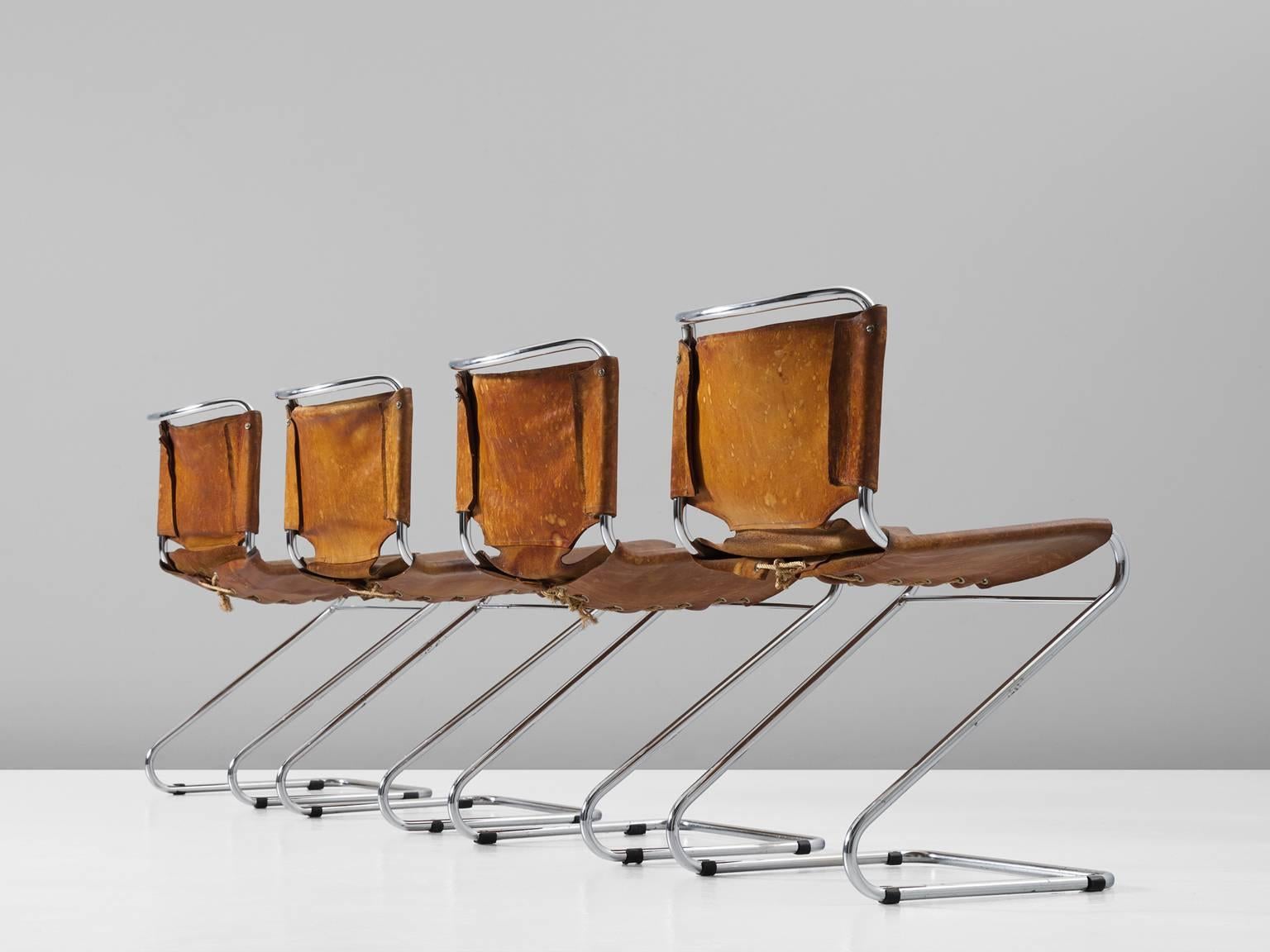 European Set of Four Tubular Dining Chairs with Patinated Cognac Leather Upholstery