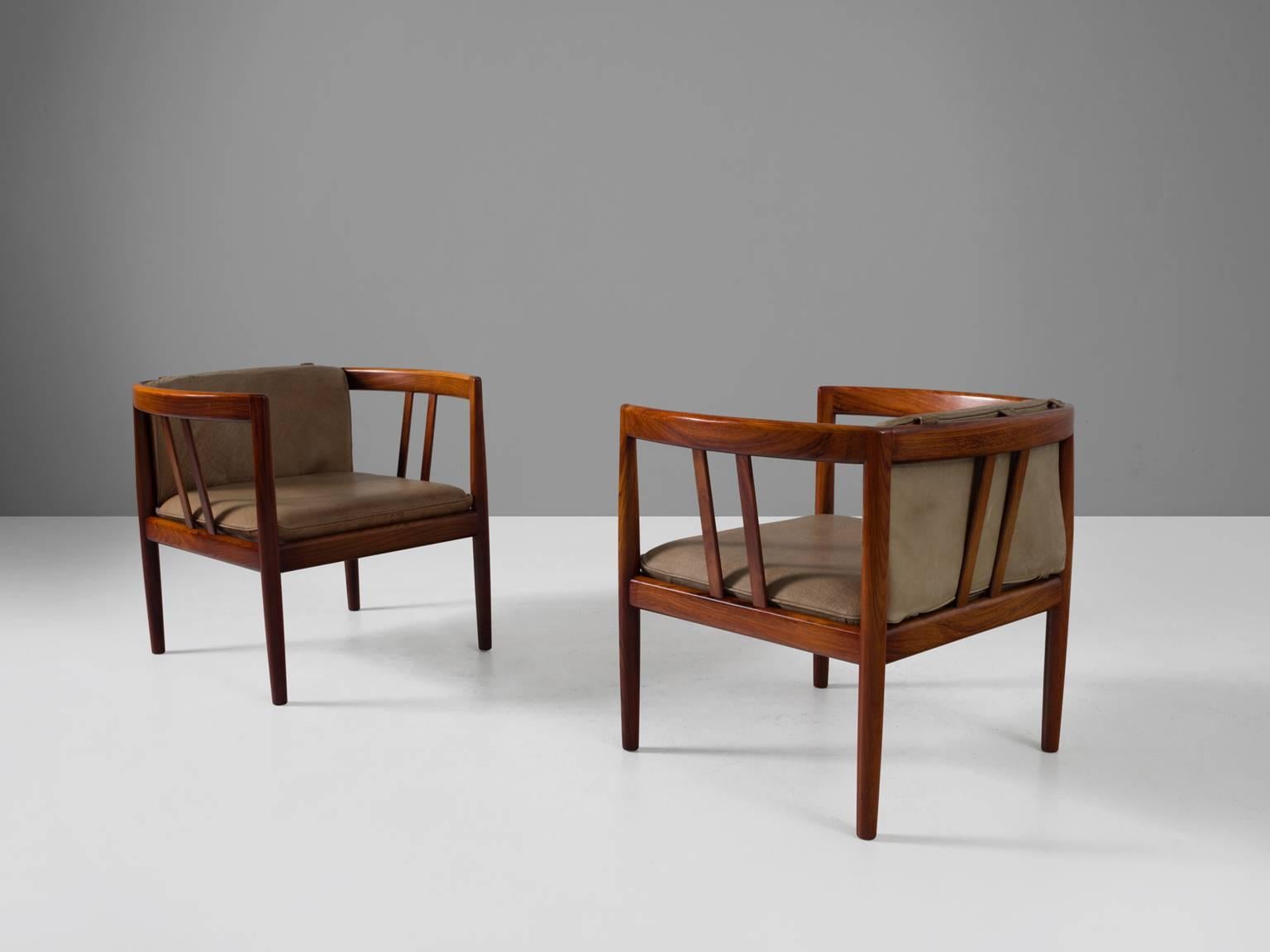 Set of two armchairs, in rosewood and leather by Illum Wikkelsø for Holger Christiansen, Denmark before 1964. 

A great looking pair of rosewood club chairs designed by Danish designer Illum Wikkelsø. These chairs, produced by Holger Christiansen