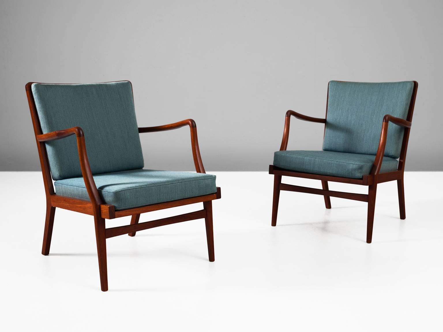 Set of two armchairs, in teak and fabric, by Peder Christensen for Jørgen Christensen, Denmark, 1950s. 

Pair of Solid Teak Lounge Chairs designed by Peder Christensen. These two chairs are of high quality, this can be seen by the well-made wood