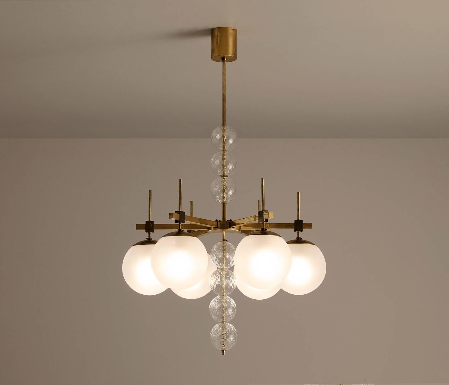 Large chandelier in brass and frosted glass, Europe, 1960s. 

Brass chandelier with six light points, shades of opaline glass. The chandelier is beautifully decorated with structured glass spheres. In combination with the frosted glass, these