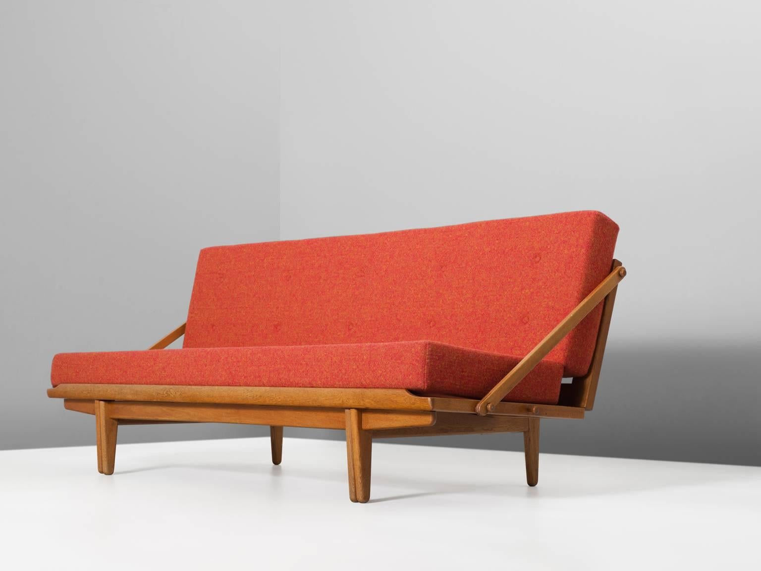 Sofabed in oak and fabric, Scandinavia 1950s.

Sofa which could easily be transformed into a bed. The oak frame has a sincere design. Nice detail is the lattice back. A very open appearance with floating character. Upholstered in organ colored