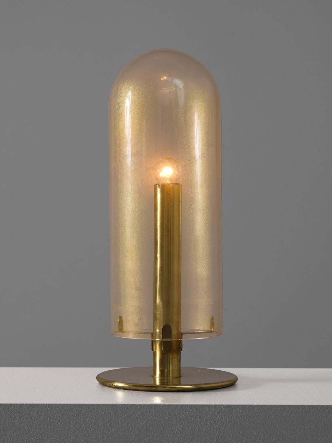 Table lamp, in glass and brass, 1930s. 

This gold speckled small glass table lamp is from the 1930s. The delicate light that shines through the glass gives off a very warm atmosphere. 

Free shipping for all European destinations and discounted