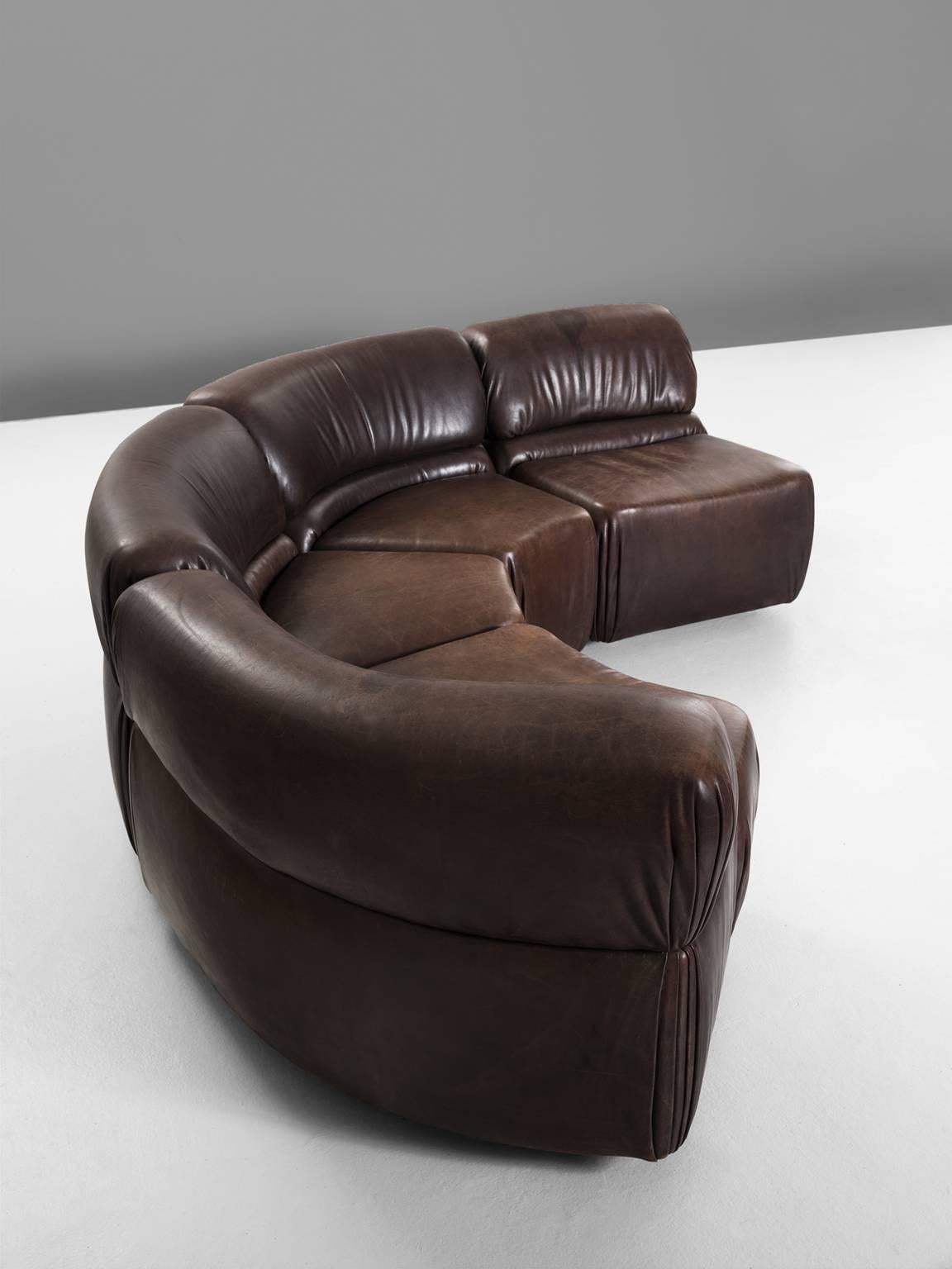 DeSede 'Cosmos', dark brown leather, four elements, 1970s.

Very exclusive modular sofa made by De Sede in Switzerland in the 1970s. Due to the seperate elements, the couch can be used in a variety of different positions. The high quality leather