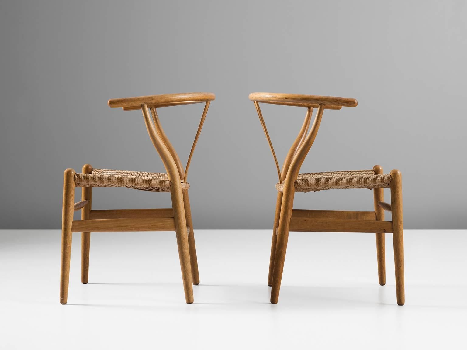 CH24 Y-chairs, oak, rope, Denmark.

The Wishbone chair, officially named CH24 is designed by Hans J. Wegner (1914-2007) in 1949 and produced since 1950 by Carl Hansen. At first, the chair was not that popular. Only a few furniture dealers were
