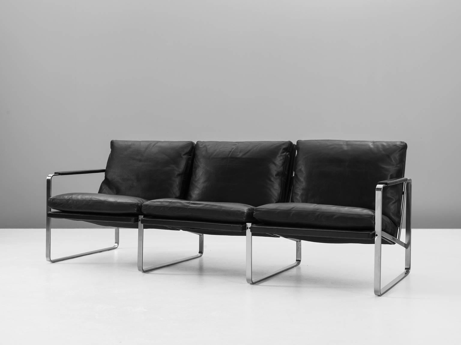 Preben Fabricius for Walter Knoll, three-seat sofa, black leather and steel, 1970s.

This very beautiful black sofa with four square steel base's is very comfortable. The soft black leather cushions provide the back with excellent support and it's