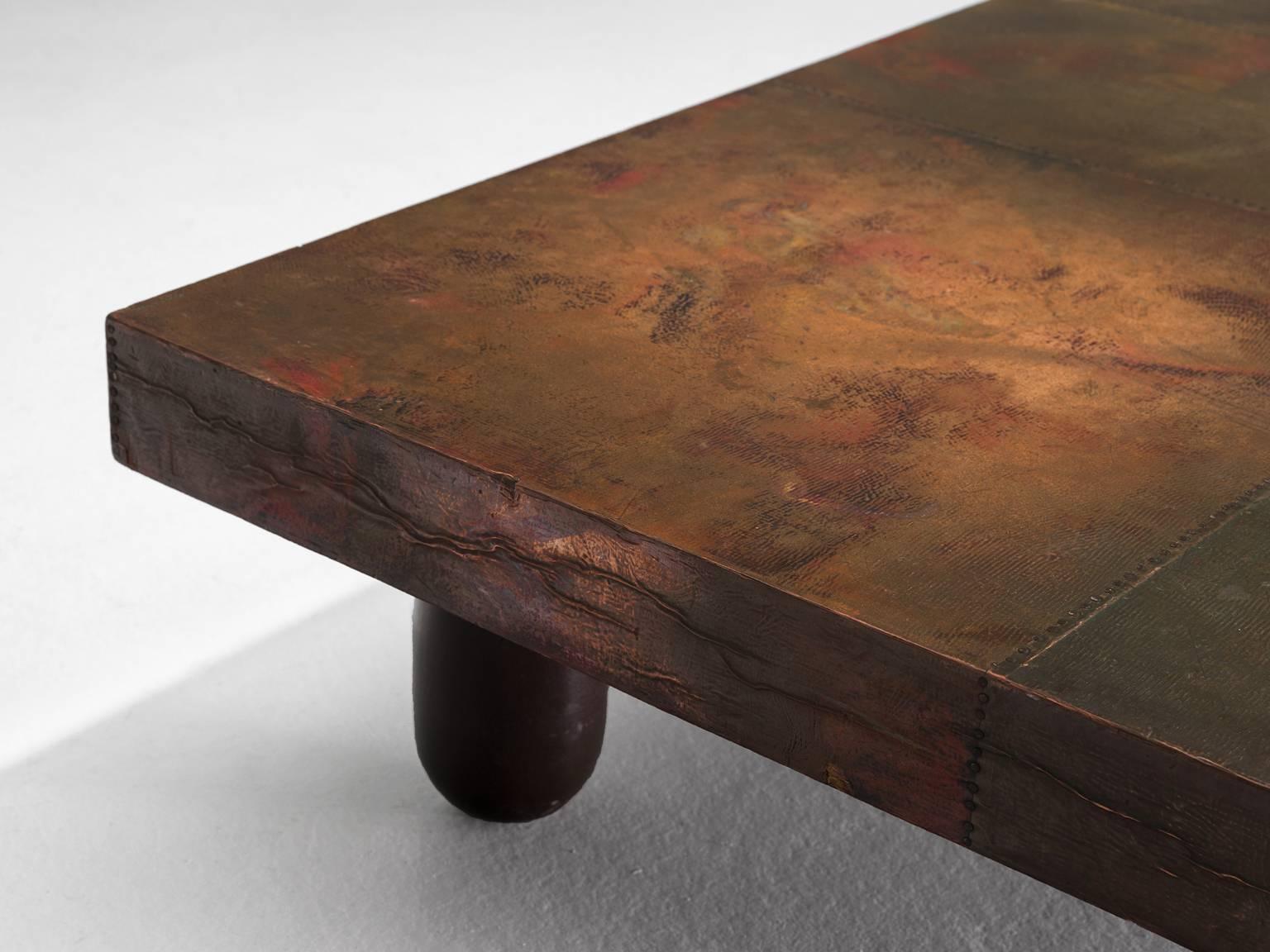 Coffee or cocktail table, copper and wood, 1960s, Italy.

This coffee table is an eye catcher. The copper is in beautiful, patinated condition and the vibrant yet natural rust or earth-like color is something out of this world. Lorenzo