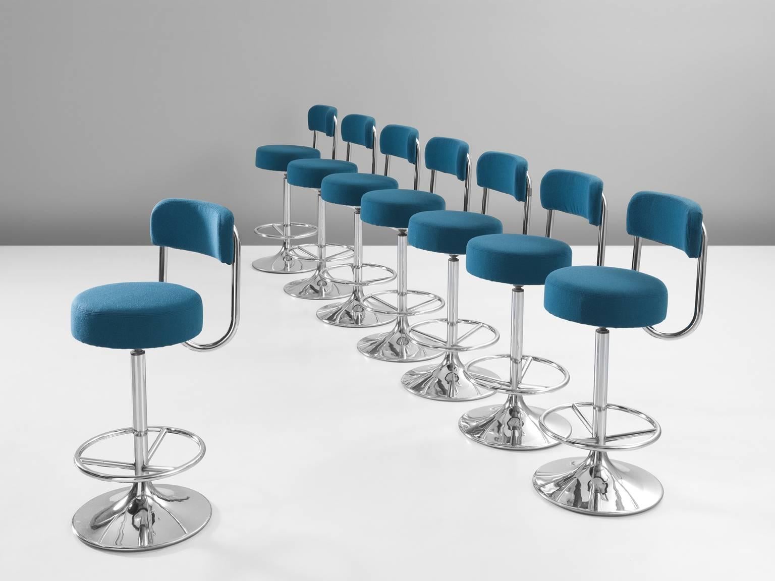Bar stools, blue upholstery and metal, 1970s.

This set of eight bar stools by Johanson Design is both comfortable and functional at the same time. The chairs are small in width yet still support the back. The main feature of this design is the