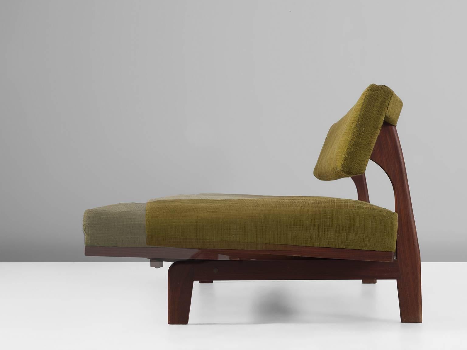 Sofa, fabric, teak, 1960s, Germany.

This small sofa is pure and clean in its appearance. The sofa can also function as a sofa bed thanks to its extendable seat. This bench is fits into a tradition of functional modern German design and is designed