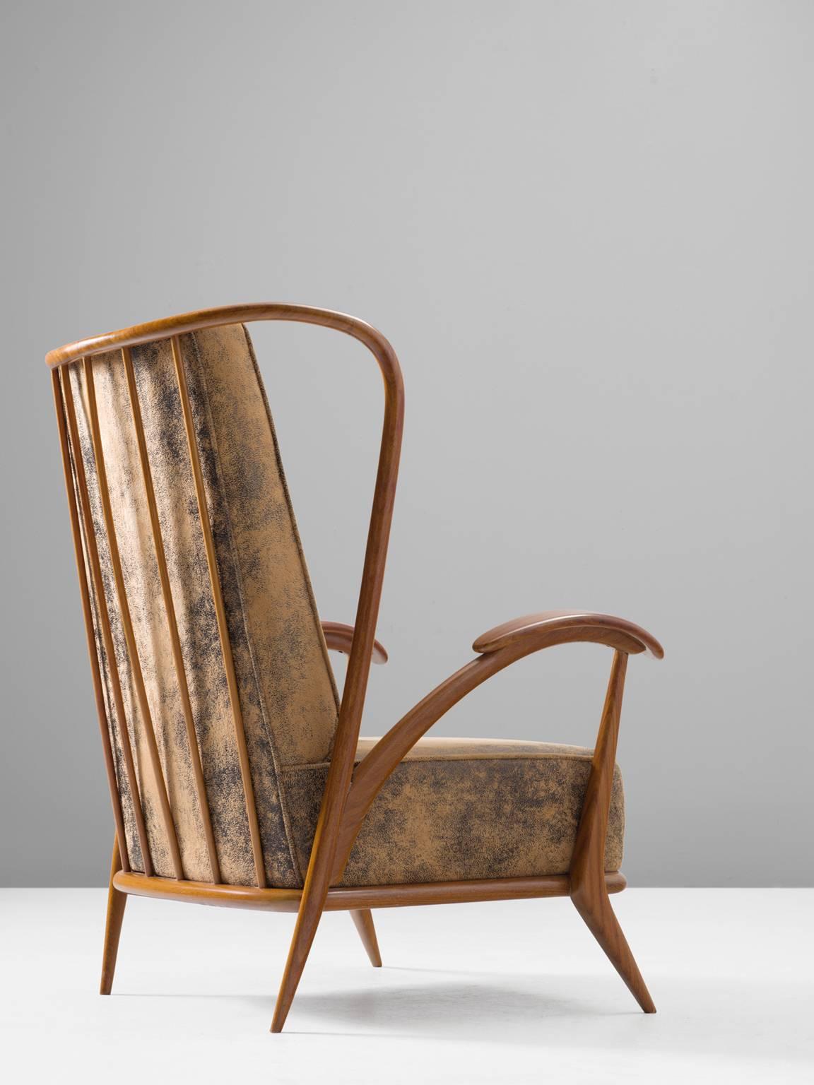 Giuseppi Scapinelli, lounge chair in rosewood and suede, 1950s, Brazil.

Giuseppi Scapinelli (1891-1982) was a designer, furniture maker and dealer in Sao Paulo. Scapinelli, born in Italy, was a designer who was on top of the zeitgeist. His