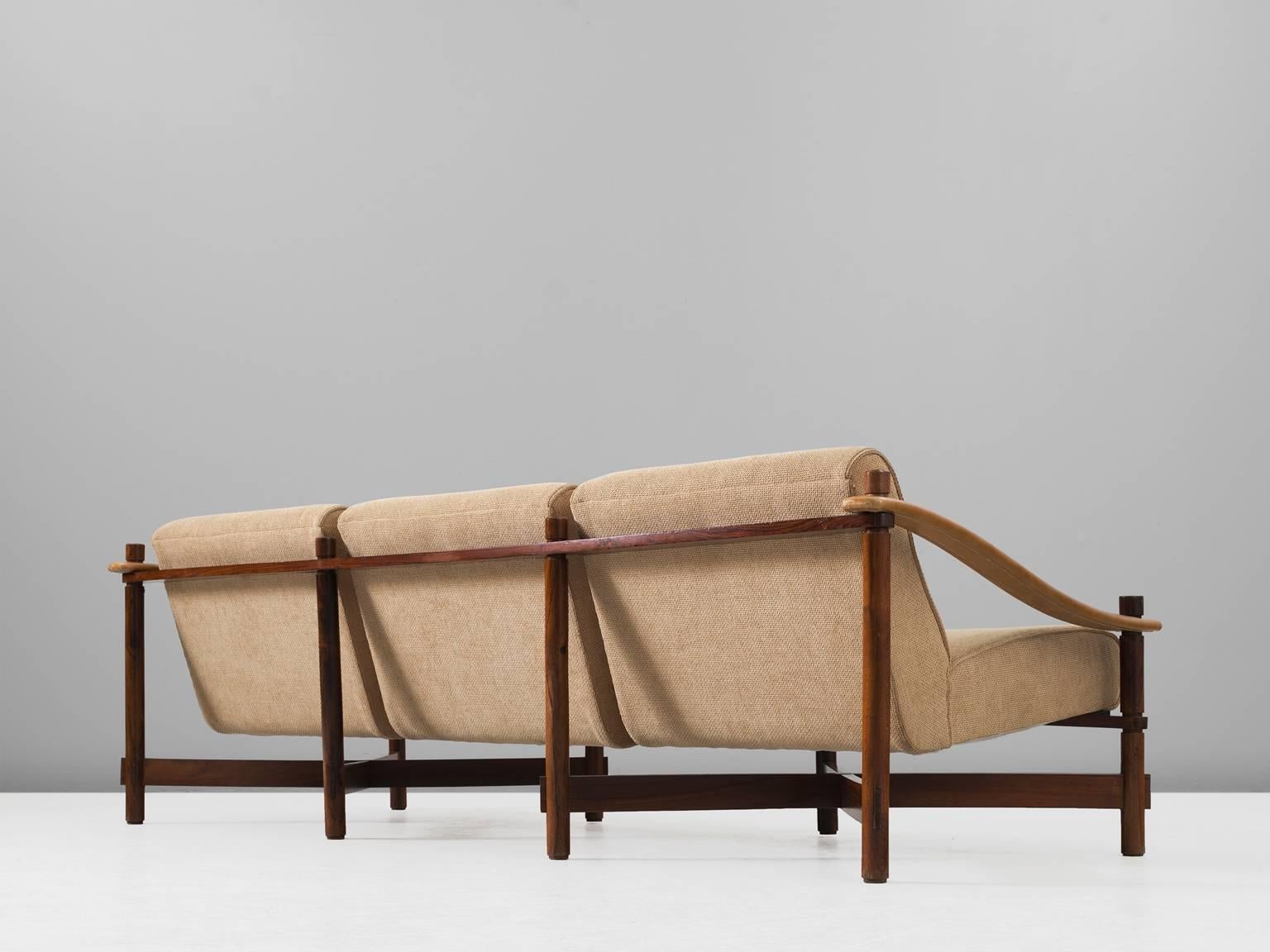 Michel Arnoult, rosewood sofa for Mobilia Contemporanea, Brazil, 1965.

This rare Brazilian sofa is of the highest-quality in both material and design. The combination of the thick woolen upholstery, the warm rosewood frame and the cognac leather