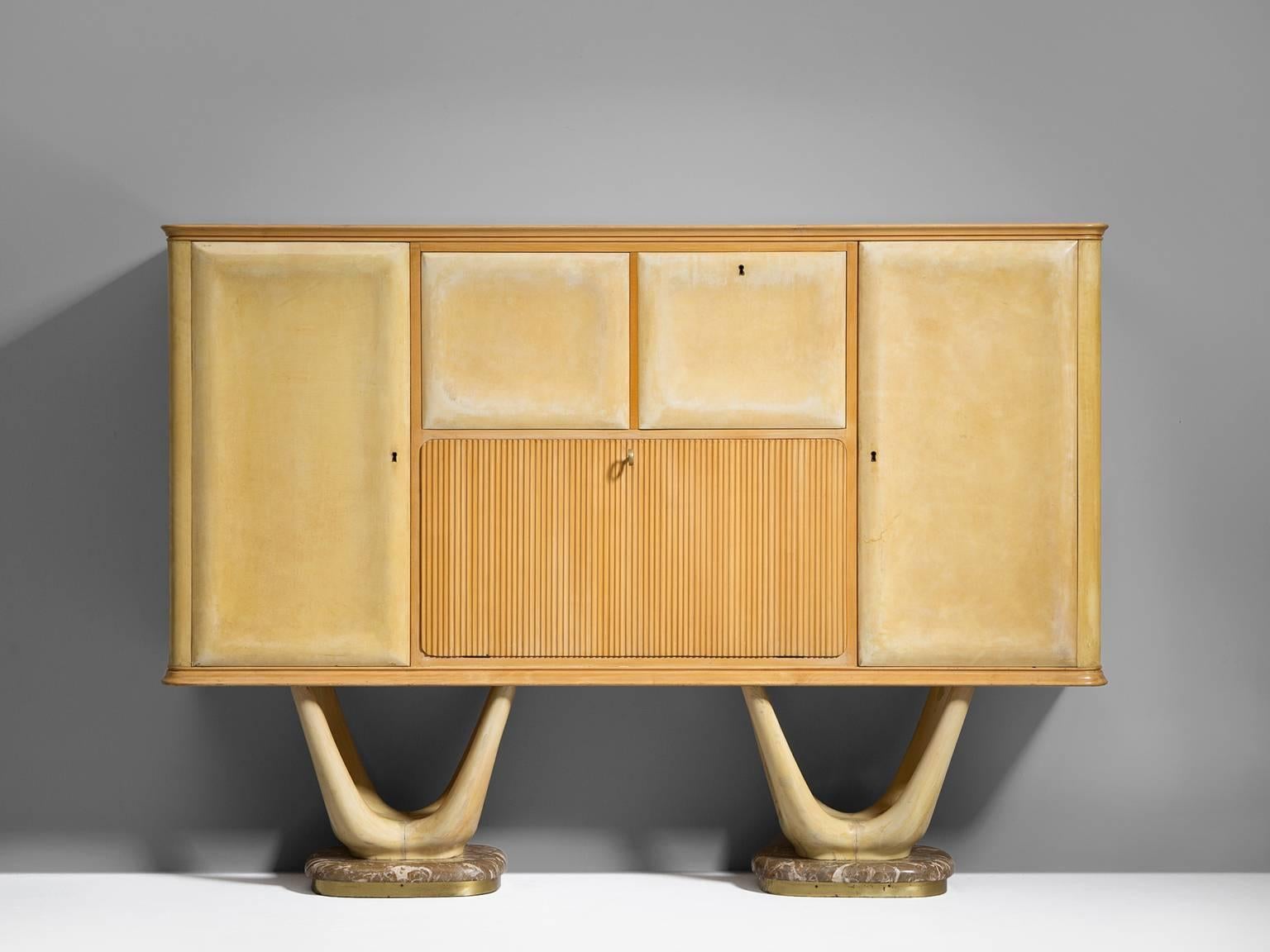 Sideboard including dry bar designed by Vittorio Dassi and made by Dassi e Figli, Italy 1950s. 

This cabinet, designed bt Vitorio Dassi (1893-1973) has a light maple wooden construction with a colored glass top. The base of this credenza is made