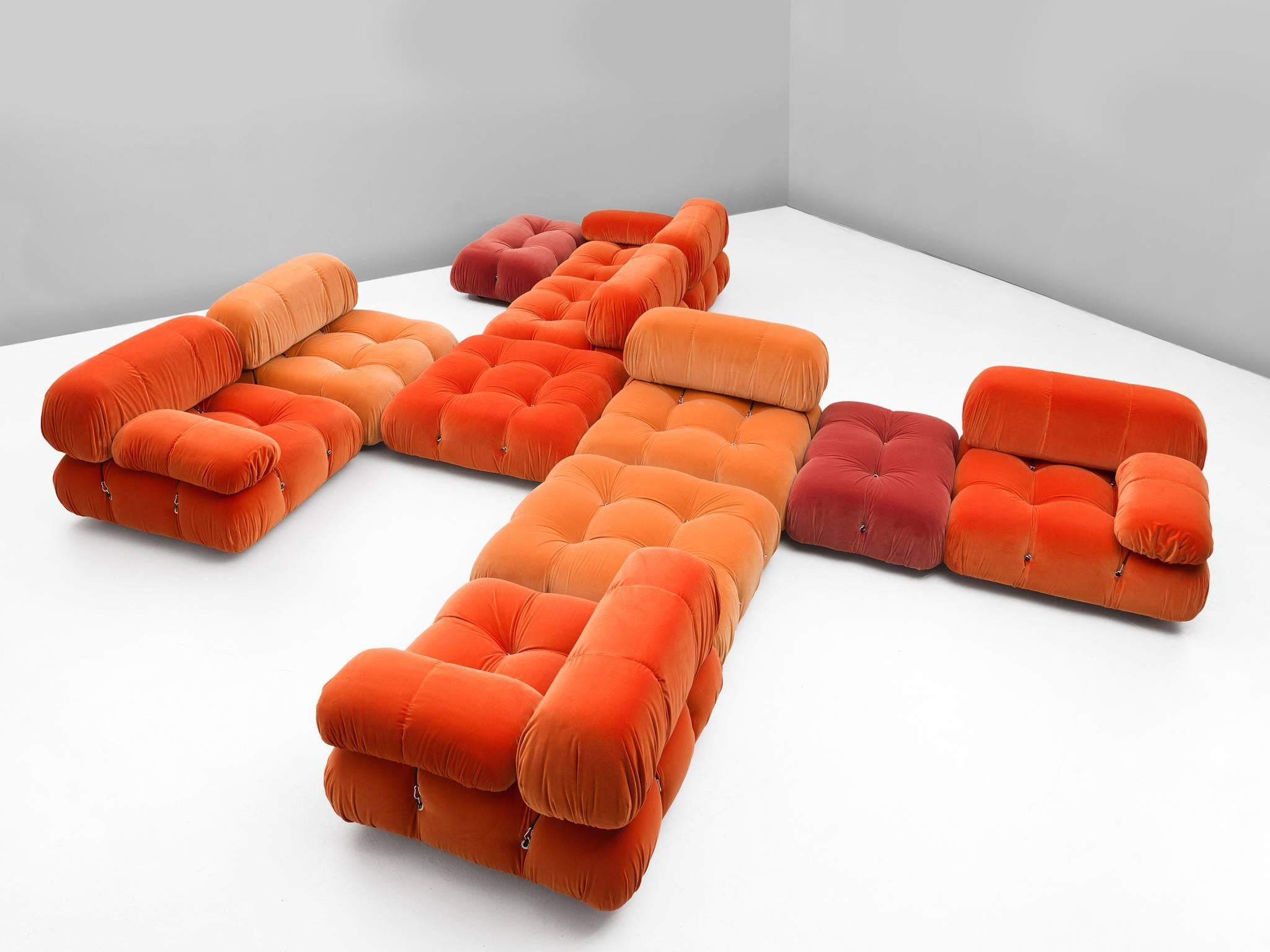 Large modular Cameleonda sofa, in orange upholstery by Mario Bellini for B&B Italia, Italy, 1972.

The sectional elements of this sofa can be used freely and apart from one another. The backs and armrests are provided with rings and carabiners,