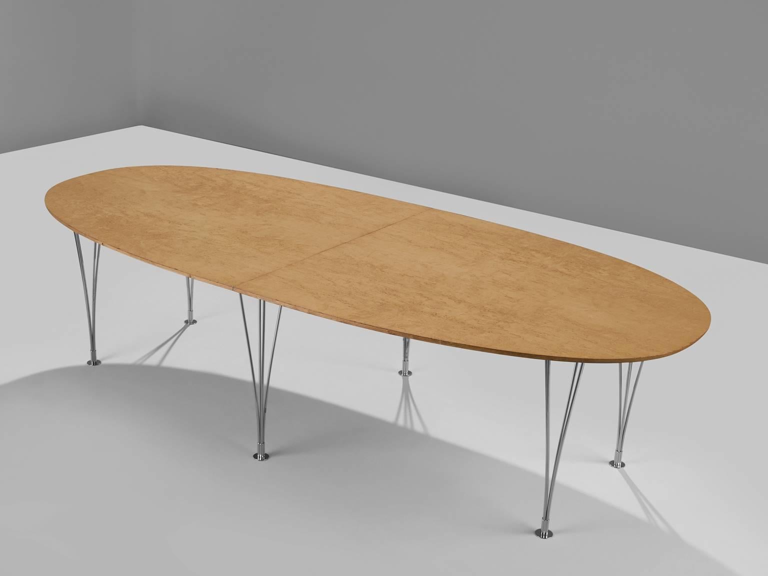 Extendable dining table, in beech and steel, by Piet Hein, Arne Jacobsen & Bruno Mathsson for Fritz Hansen, Denmark, 1968. 

Super-Ellipse dining table with two extension leaves, in beech and steel. This version is produced by Fritz Hansen in