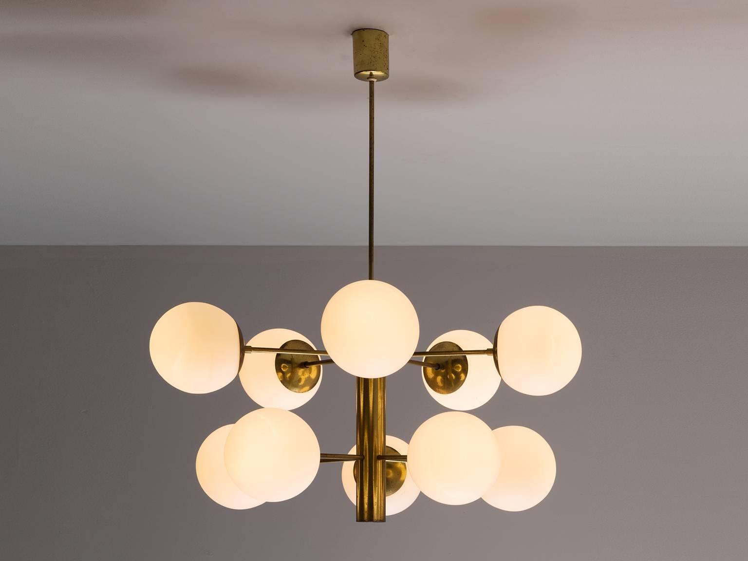 Sputnik chandelier, in brass and opaline glass, Europe, 1970s. 

This double layered Sputniks has ten opaline glass balls. The chandelier consist of a brass fixture with ten arms, all with an opal sphere. Due the frosted glass this pendant creates
