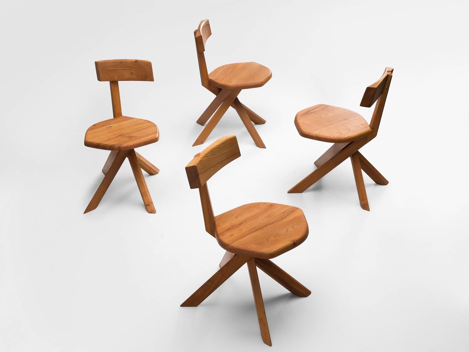 Four chairs, S34, in elm by Pierre Chapo, France, 1960s.

These four asymmetrical chairs with twisted base are icons of Pierre Chapo's playful and solemn designs. These chairs are made of solid elm and show the characteristics of Pierre Chapo.