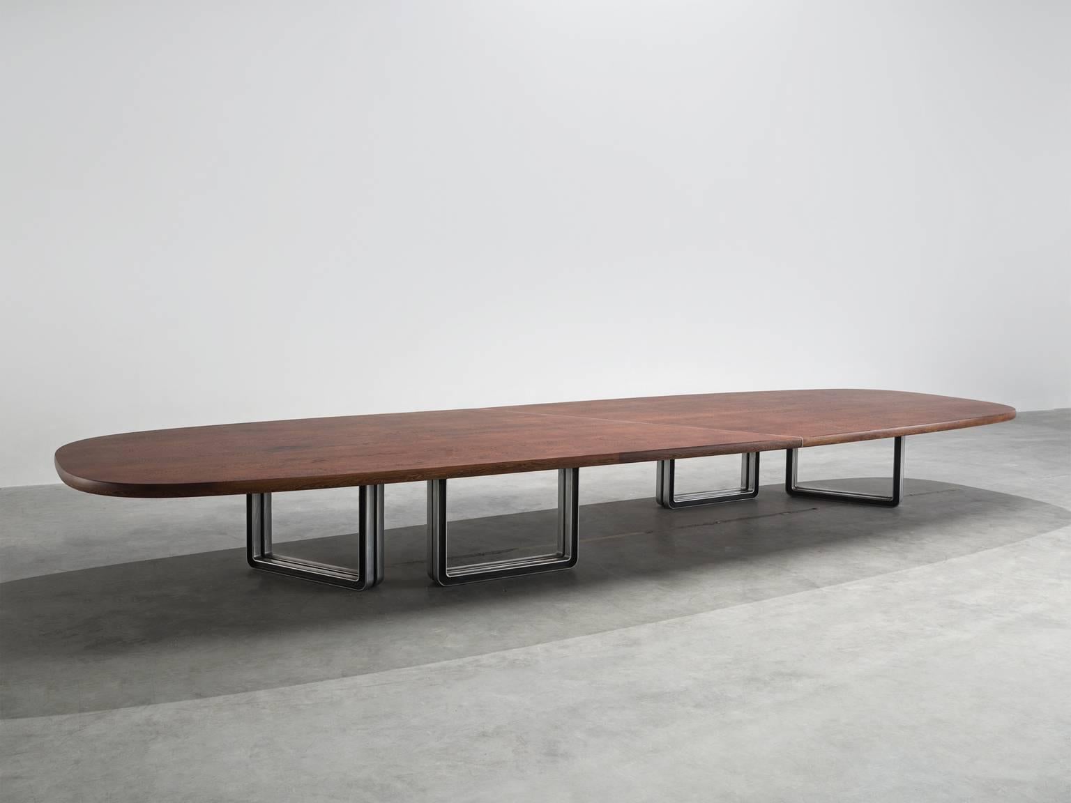 Tecno Design Centre for Tecno, wenge (lati) top and aluminum base, conference table 335a, Italy, 1975-1978.

Large oversized conference table with a wenge veneered top. The table is composed of two pieces connected via steel inserts and mounted on