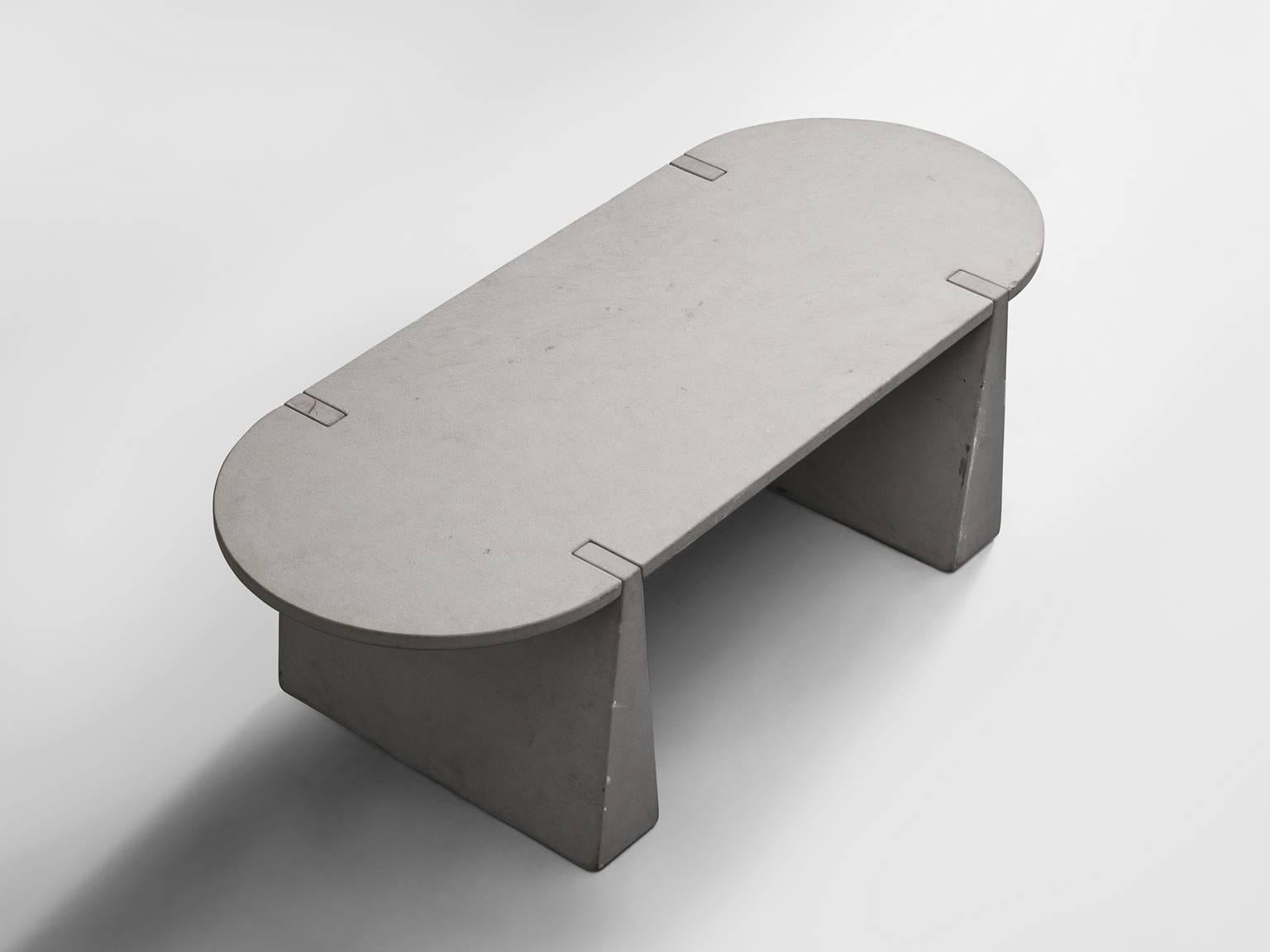 Large dining table in concrete by Angelo Mangiarotti, Italy 1970s.

This sculptural table by Angelo Mangiarotti is a skilful example of postmodern design. The sturdy table shows a strong character due to its simplicity, as to be seen more often in