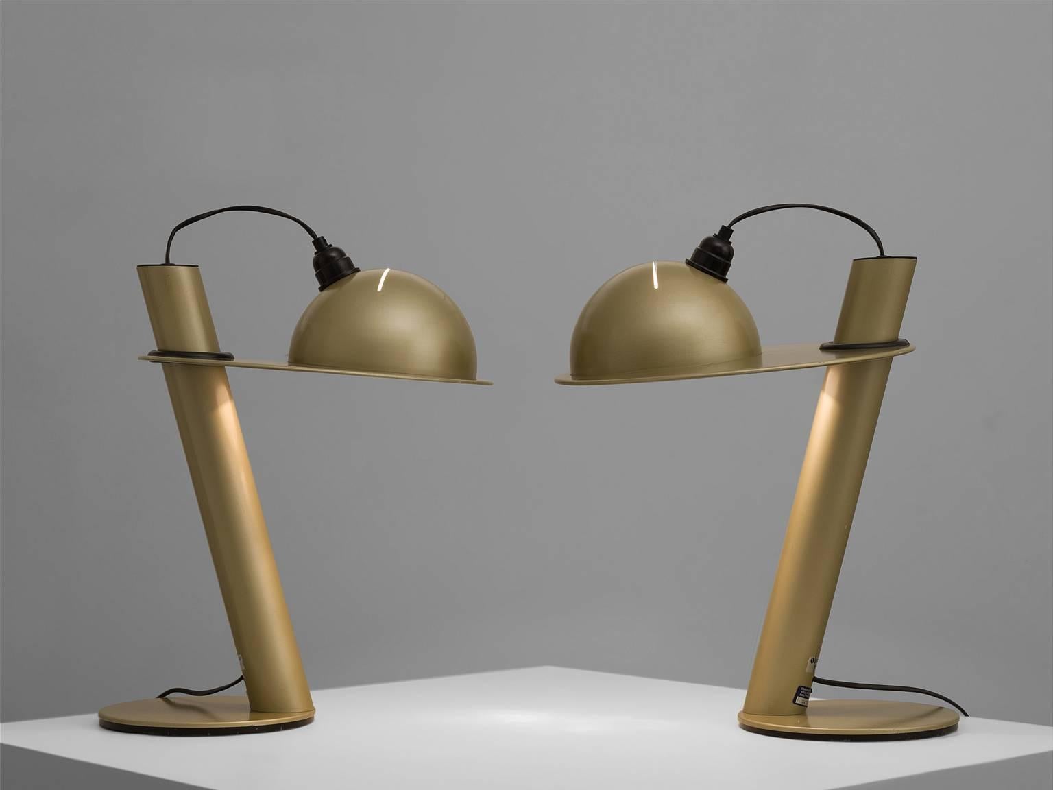 Desk lights, Ettore Sottsass for Stilnovo, enameled metal lamp in taupe, Italy, 1970.

This pair of enamaled table lamps are adjustable in height. They feature a rubber-monted helmet shade. The shaft of these postmodern lights consists of a