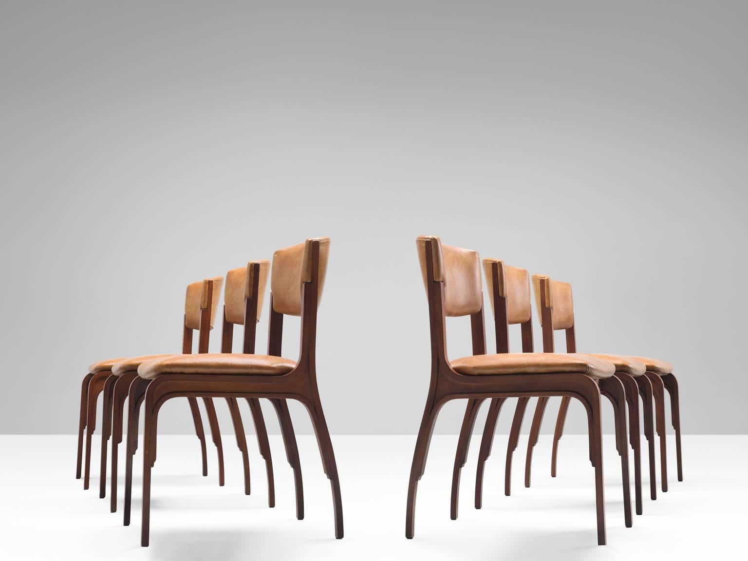 Six chairs, beige faux leather, beech, by Gianfranco Frattini for Carugati Cantieri, Italy, 1950s. 

This delicate set of six dining chair are executed in aniline bent and stained lamellar beechwood. The chairs main feature are the wide legs that