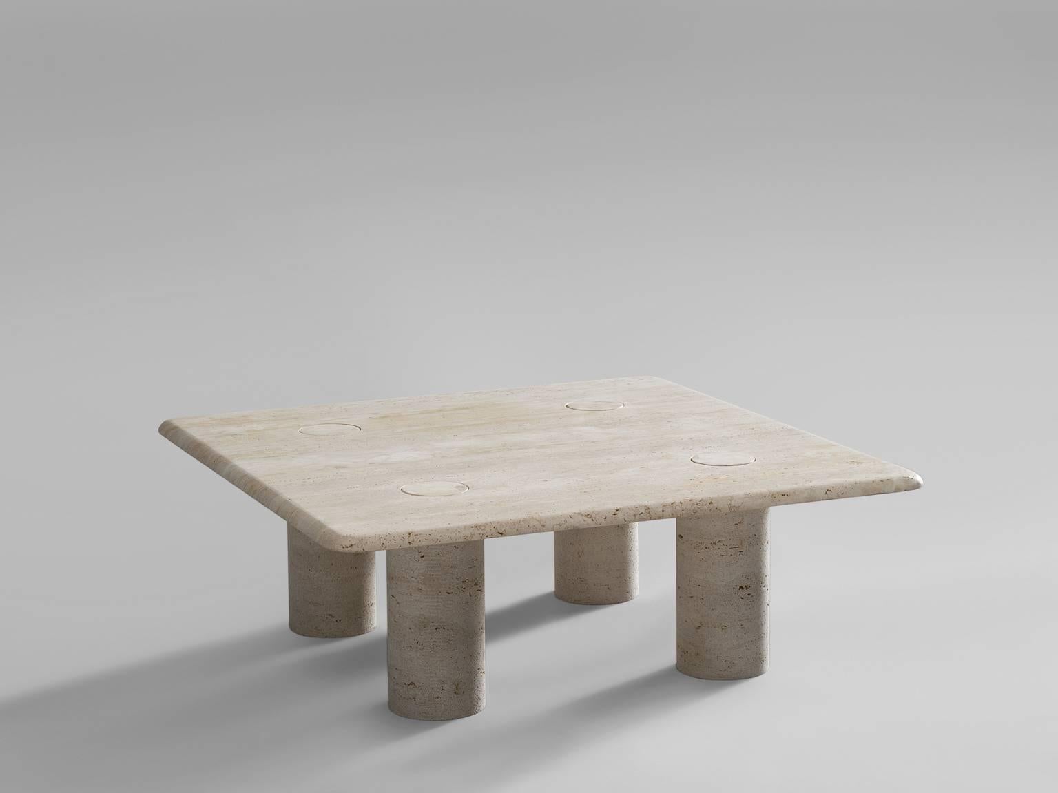 Coffee table in travertine, by Angelo Mangiarotti for Up&Up, Italy, 1970s.

This sculptural table by Angelo Mangiarotti is a skillful example of postmodern design. The cocktail table is executed in travertin. The square top features no joints or