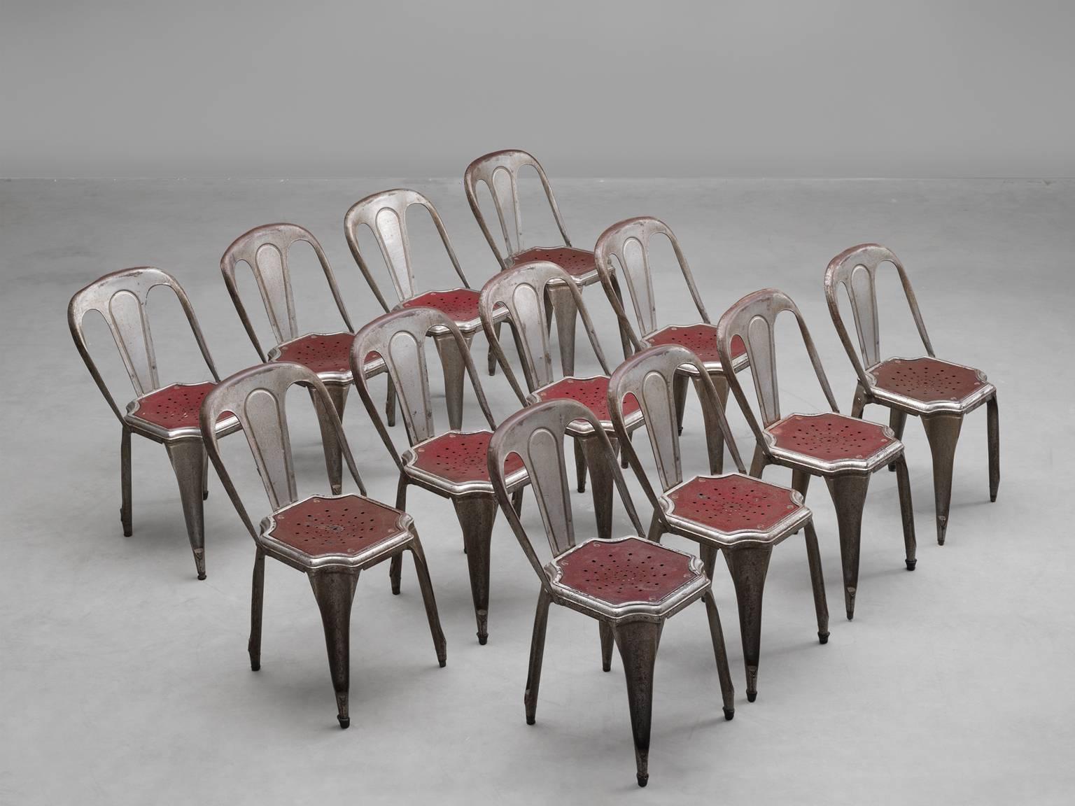 Large set of stackable chairs by Fibrocit Bruxelles, Belgium 1950s.

This typical metal chair has a playful design. The open character of the construction gives it a light appearance, and the nice patina gives it a lot of expression. 

More