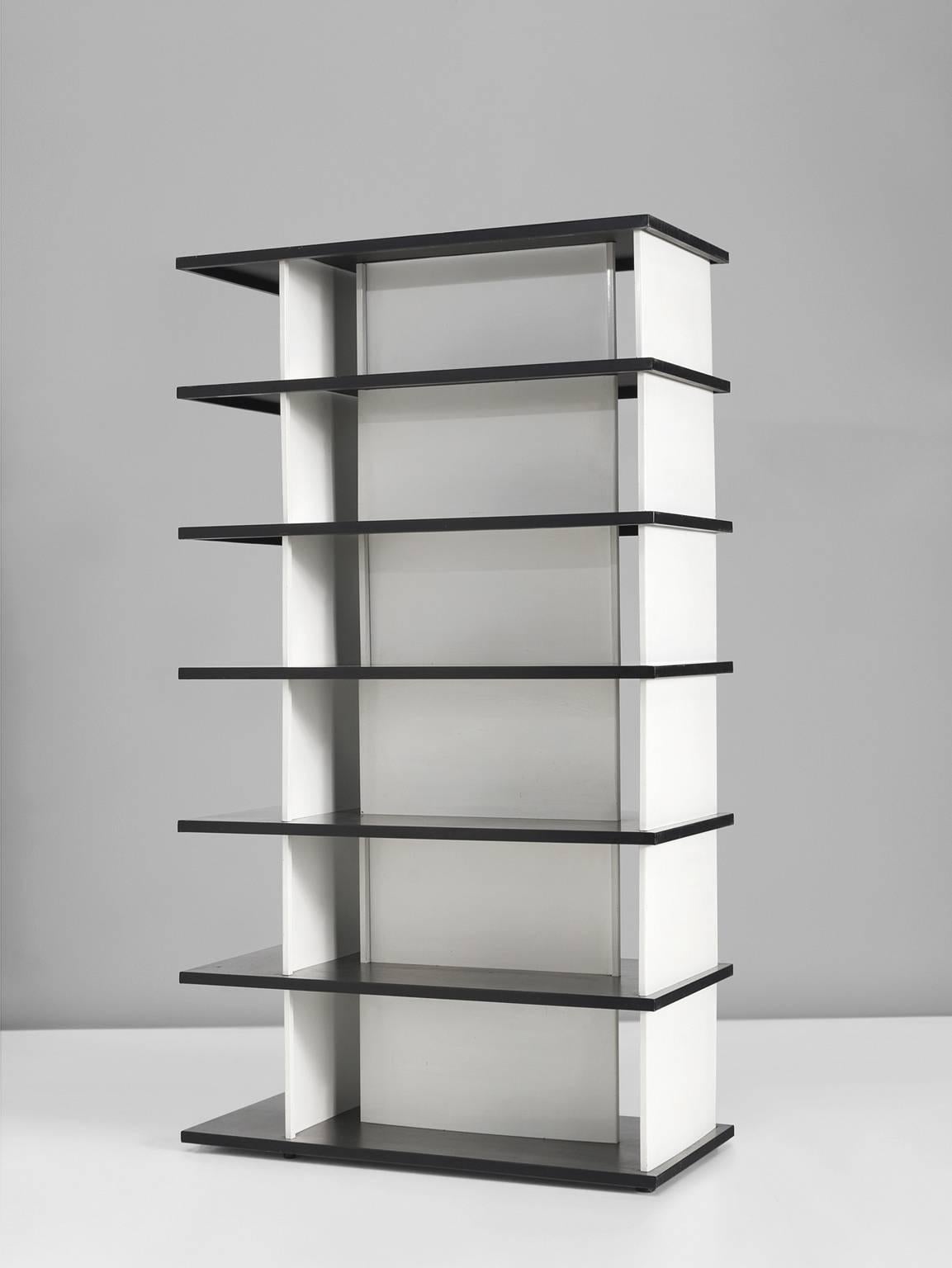 Wim Rietveld, bookcase, enameled metal,  he Netherlands, 1960.

This self supporting bookcase was originally made for 'De Bijenkorf', a Dutch high end department store in 1960. The piece consists of seven black enameled shelves and can be used on