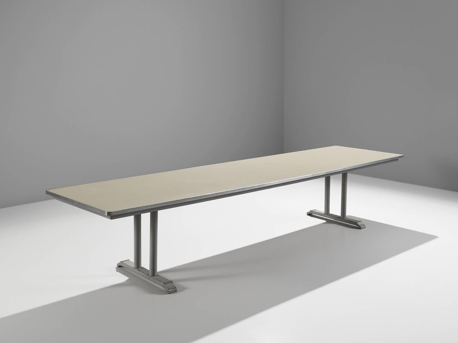 Conference table, linoleum top with aluminium foot, Chris Hoffmann for Gispen, The Netherlands, 1949. 

This four meter long conference table is produced by Gispen (1916-) and designed by Chris Hoffmann. The table features two trestle bases legs.