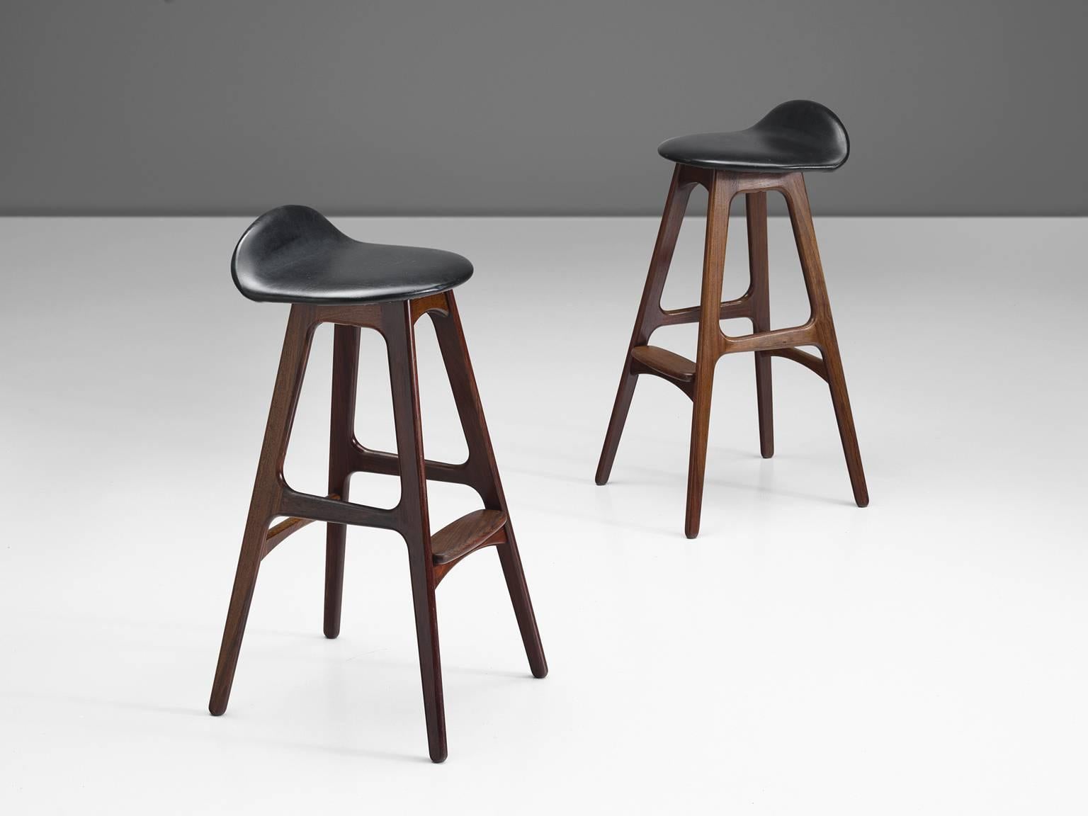 Set of two Erik Buch for O.D. Mobler, bar stools, rosewood and faux leather, Denmark, circa 1960s.

Distinctive set of two barstools by Erik Buch (1923-1982). Buch had over 30 commercially successful production designs over his career but none so