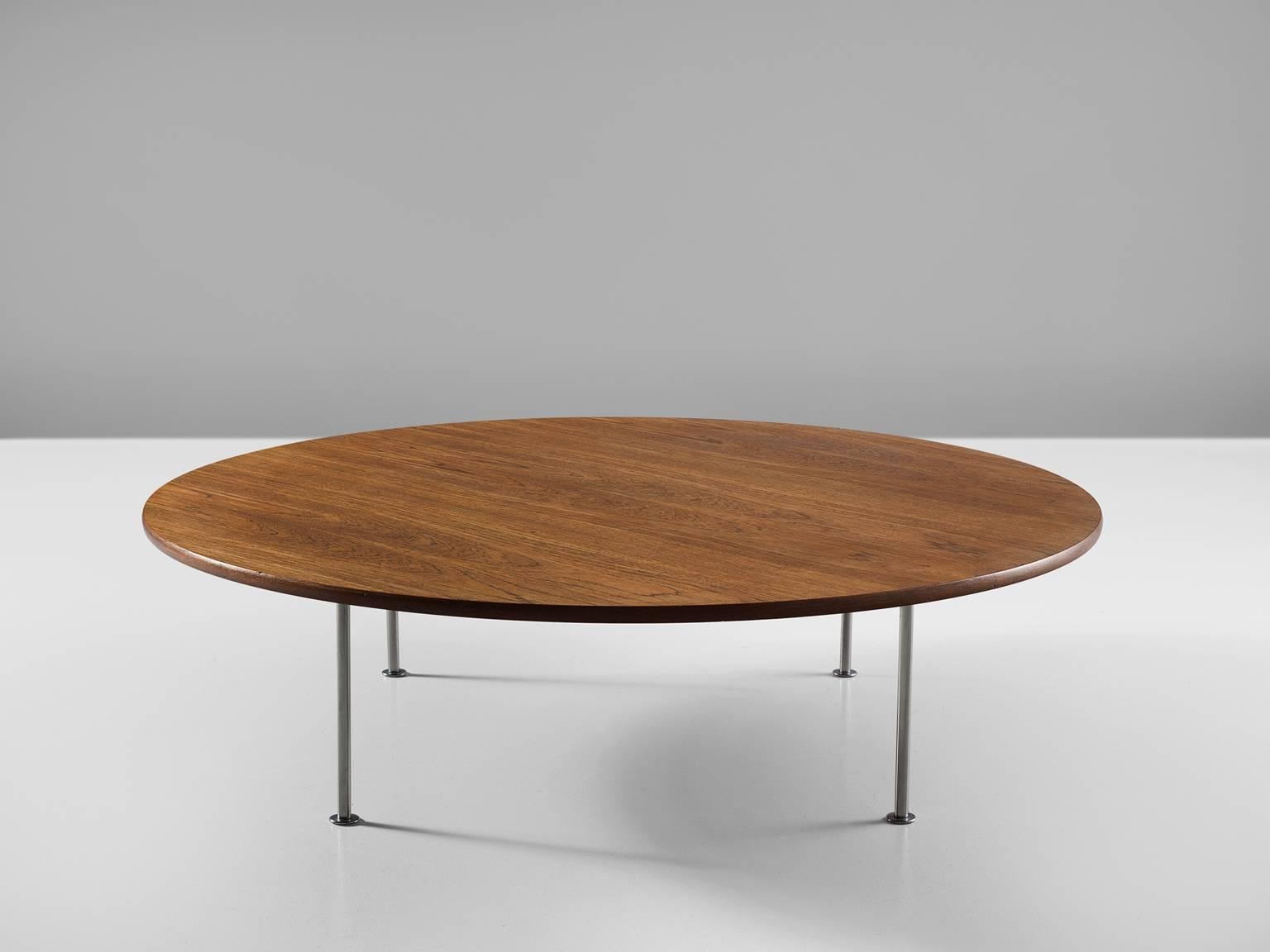 Coffee table, teak and chromed steel by Hans J. Wegner for Andreas Tuck, Denmark, 1950s.

This large coffee table with a teak circular top is a true example of Wegner's simple but majestic designs. The proportions of this modest (but large) coffee