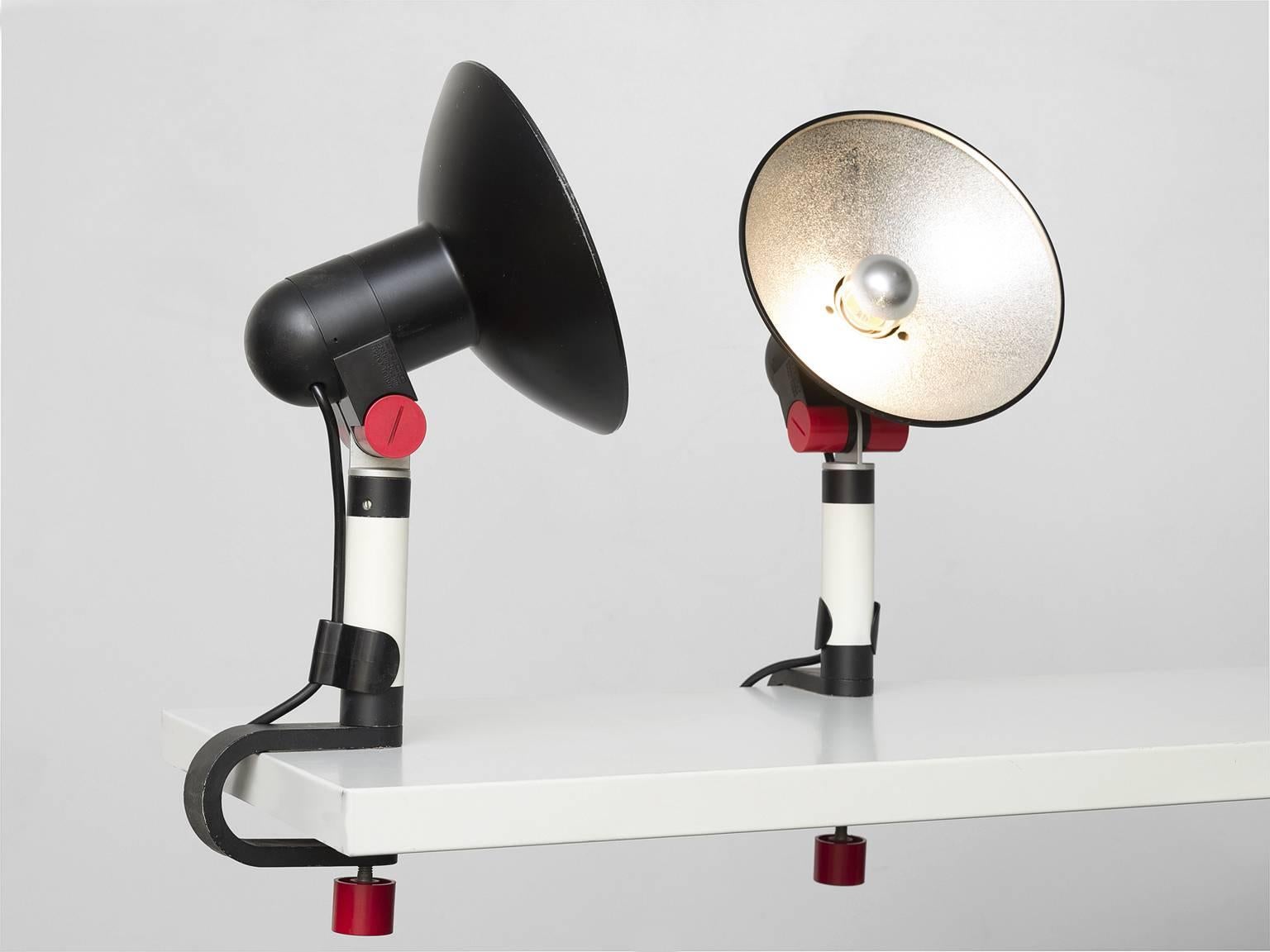 Table lamps, 'Spot' designed by Roger Tallon for Erco, black iron cast, grey lacquered metal, metal, fitting in black and red ABS plastic, France, 1972.

These table lamps are iconic lamps by the French designer Roger Tallon. The black and white
