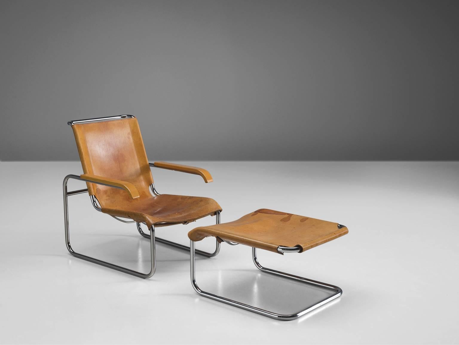 Lounge chair B35 with ottoman, leather and tubular steel by Marcel Breuer for Thonet, Germany, 1928. 

This lounge chair is executed in cognac leather and tubular steel. The B35 by Marcel Breuer exists of a cantilevered chair and matching ottoman.