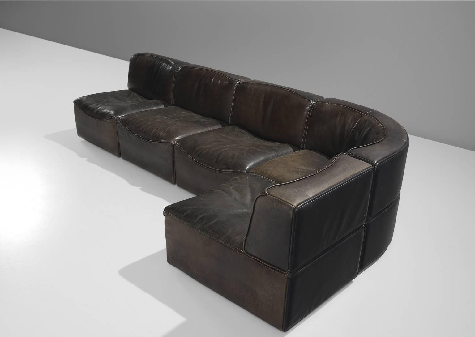 Sectional sofa model DS-15, 5 elements, in leather by De Sede, Switzerland, 1970s. 

This sectional sofa contains one corner element and four normal elements. The section make it possible to arrange this sofa to your own wishes. The design is